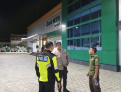 Polsek Pemenang Laksanakan Patroli Dialogis dengan Security Bank Syariah Unit Pemenang